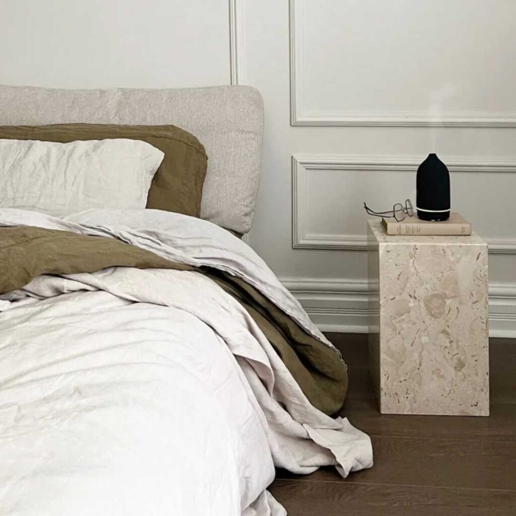 A bedroom with a a diffuser