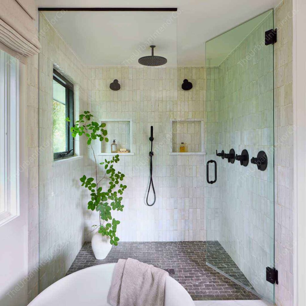 a bathroom shower stall with a plant inside