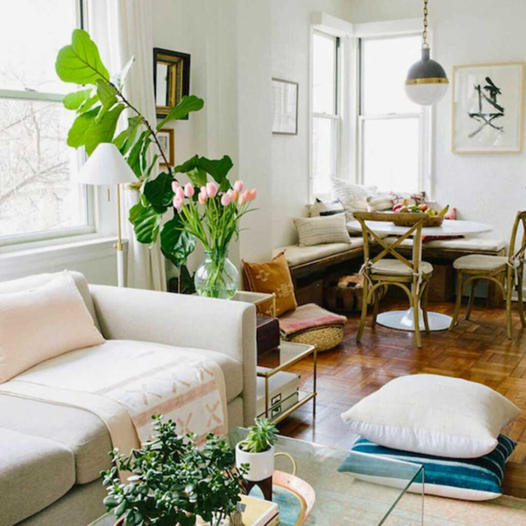 a dining area in a corner beside living room