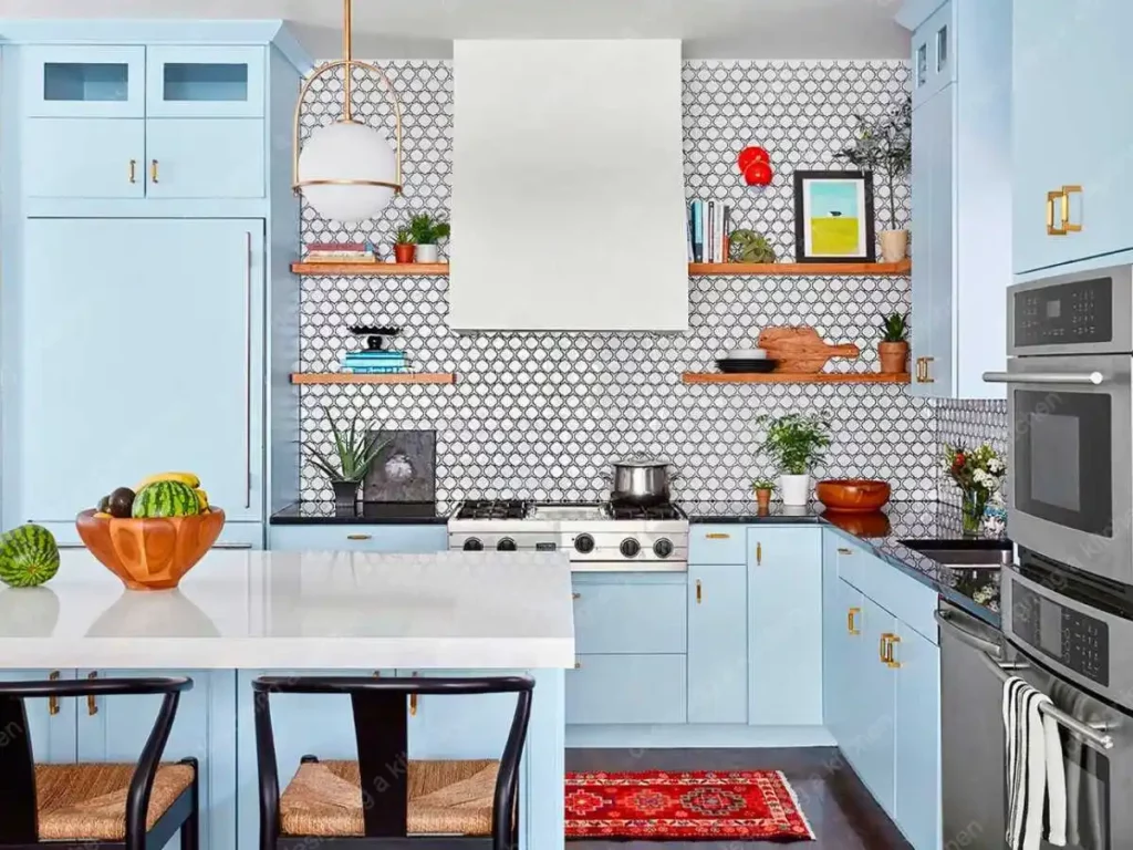 a kitchen with blue cabinets