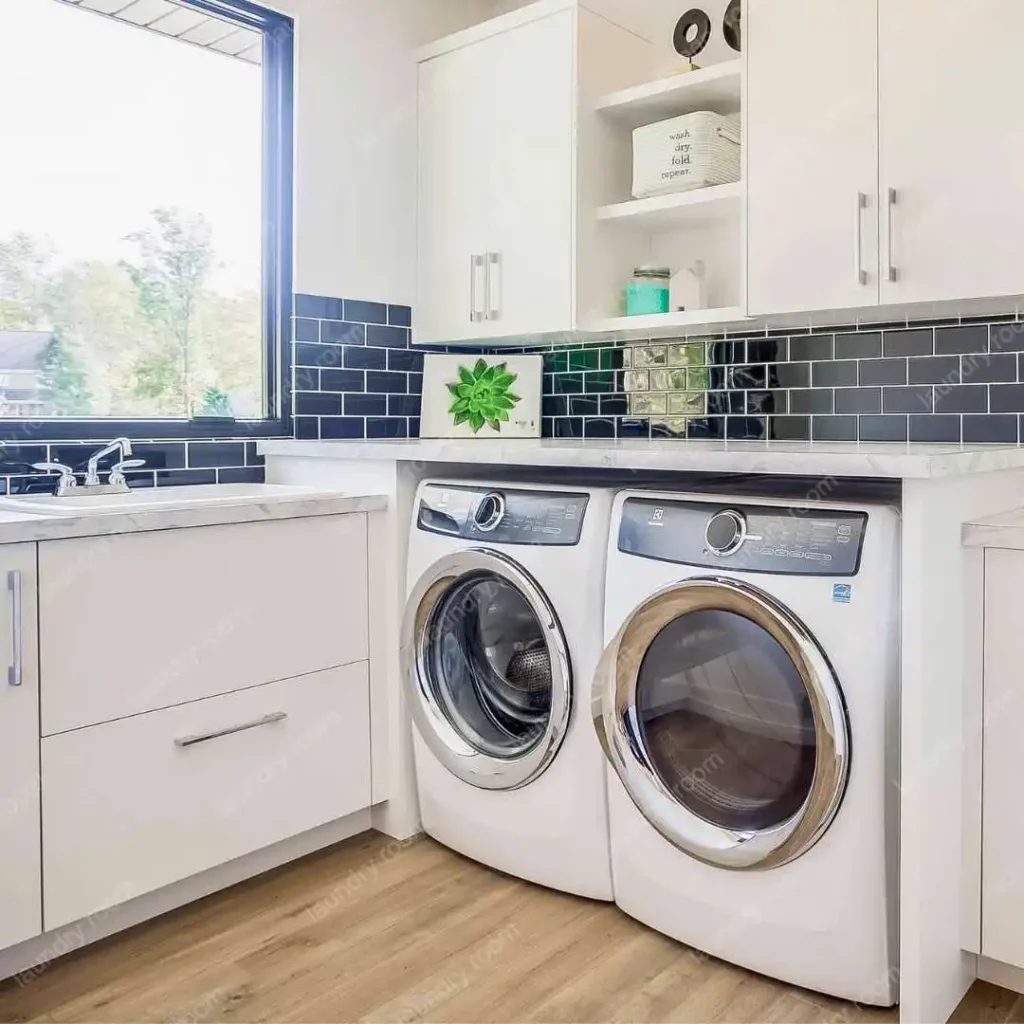 a laundry room with tile backsplash