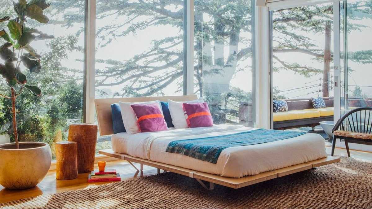 a bedroom with unique bed frame