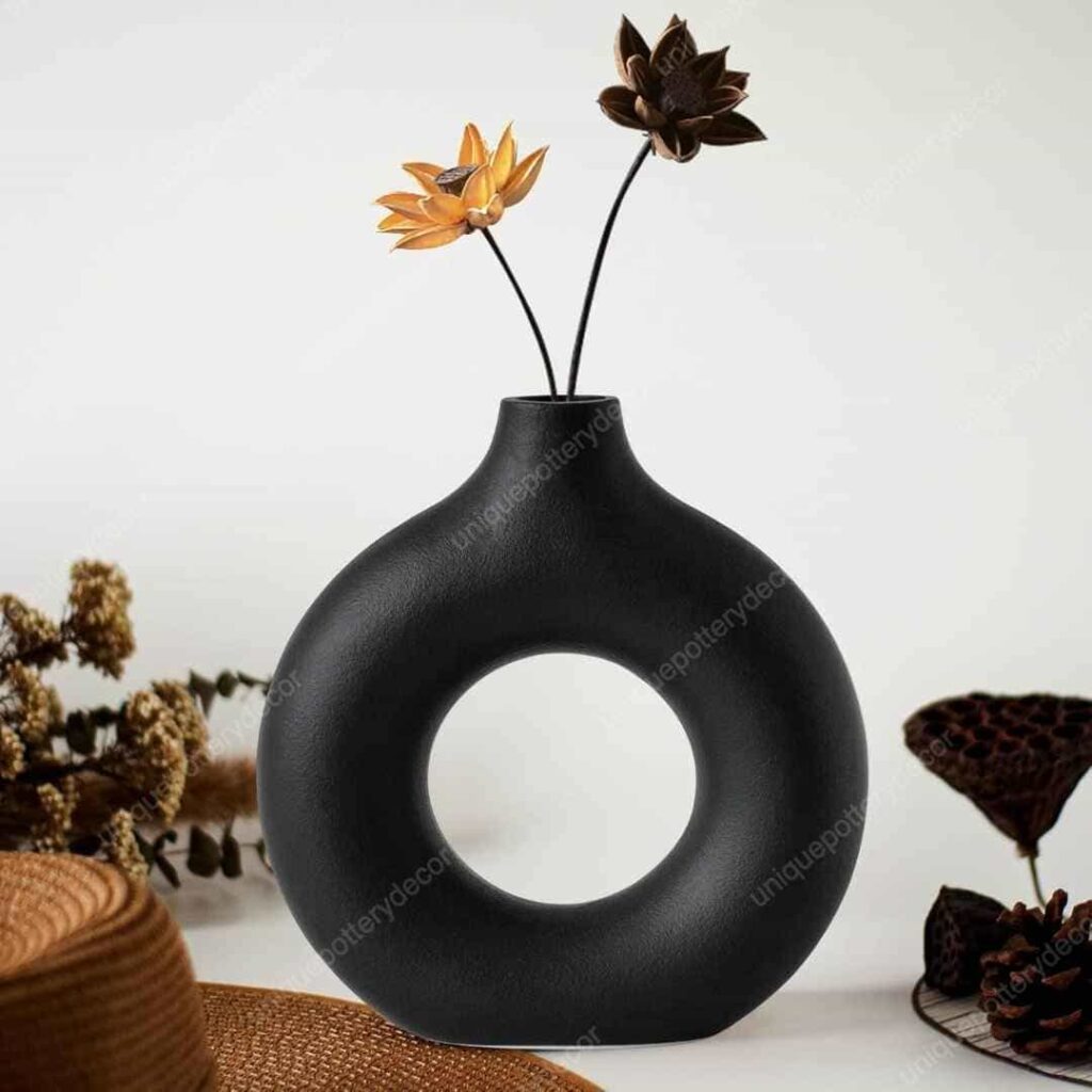 a black donut vase