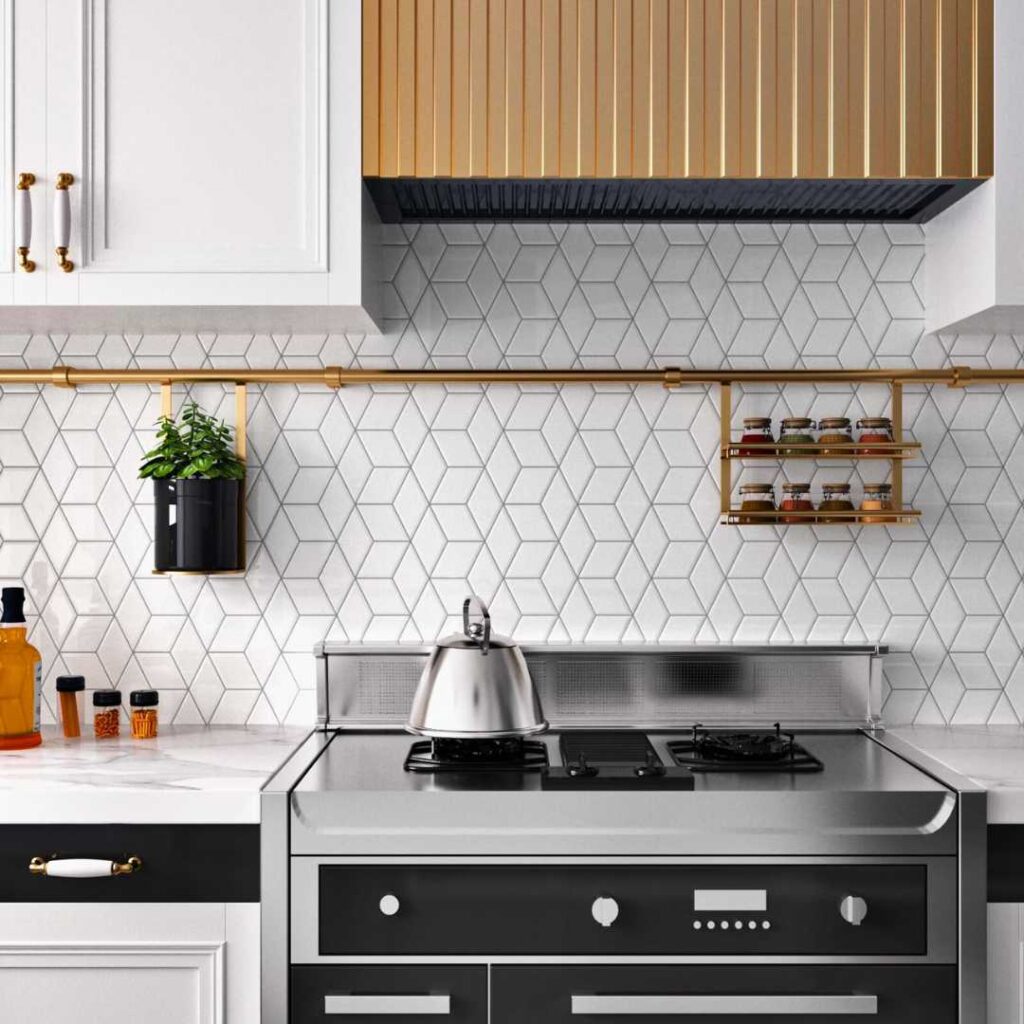 a kitchen with geometric tile backsplash