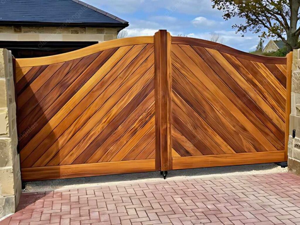 a herringbone patterned driveway wooden gate