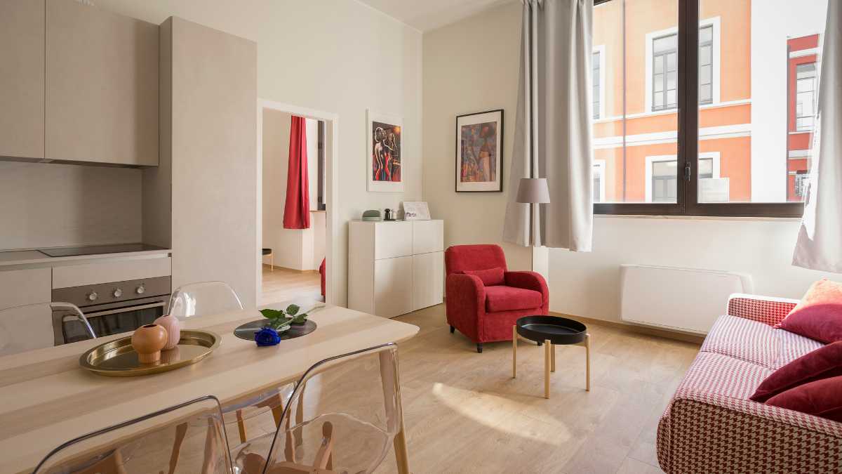 a living and dining room in an apartment