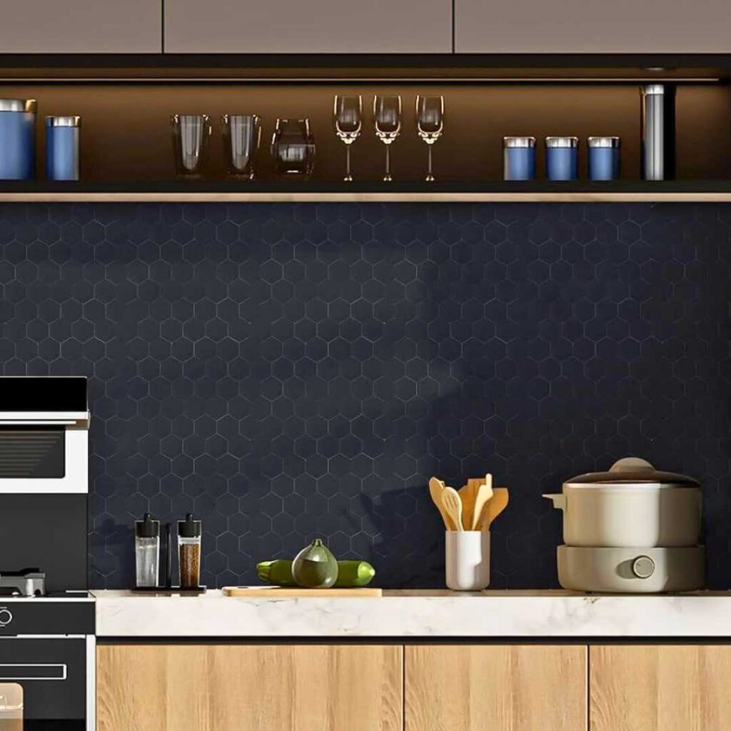 a kitchen with a matte black peel and stick backsplash