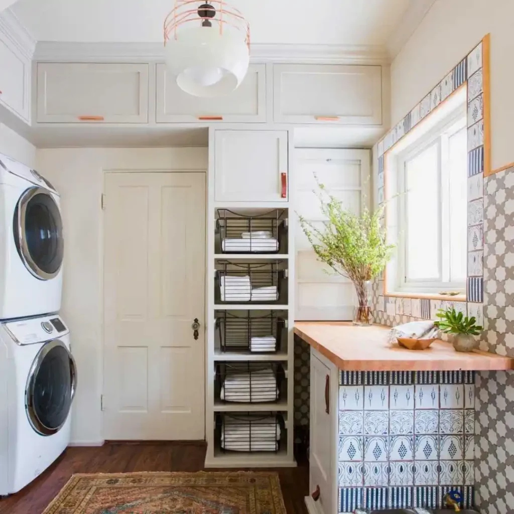 laundry room with stacked washer dryer