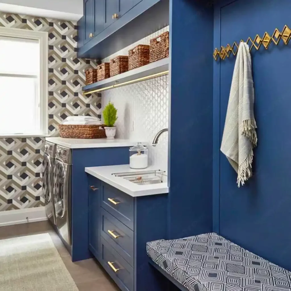 laundry room with dark blue cabinets