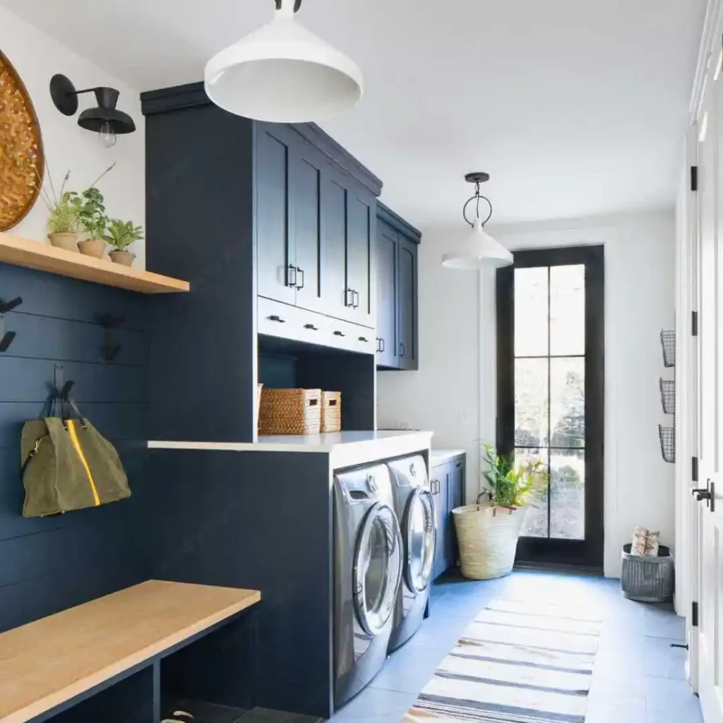 laundry room with dark blue cabinets