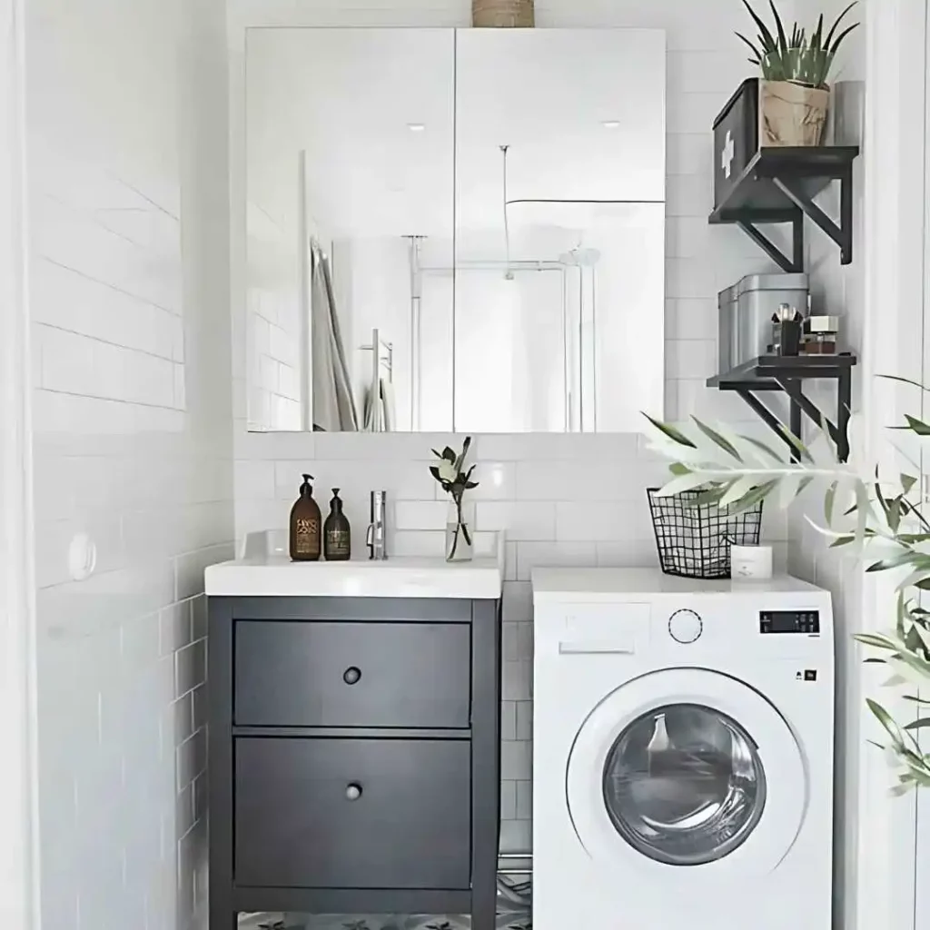 small laundry room with mirror top cabinet