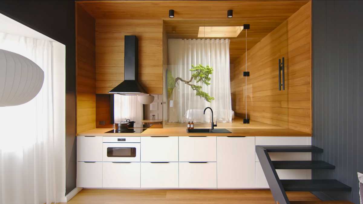 a kitchen of a zen designed apartment