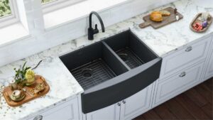 a black apron kitchen sink with black faucet