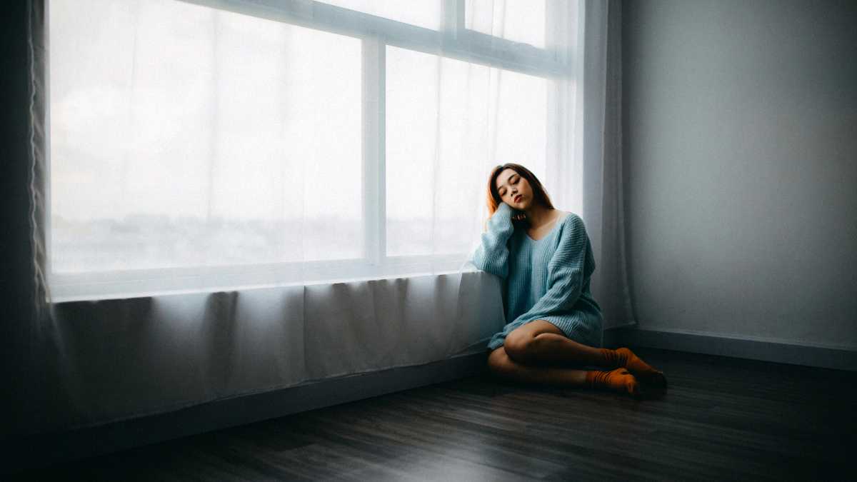 a girl in an empty room