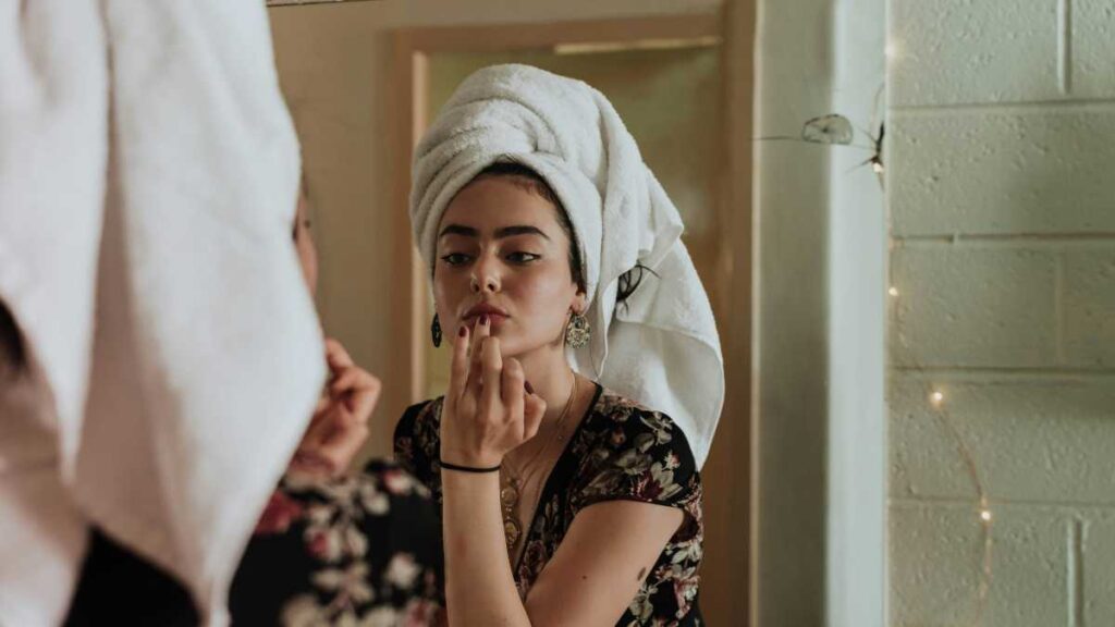 a girl in front of a mirror