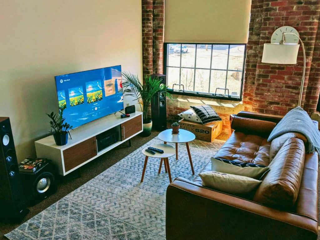 a masculine living room with tv