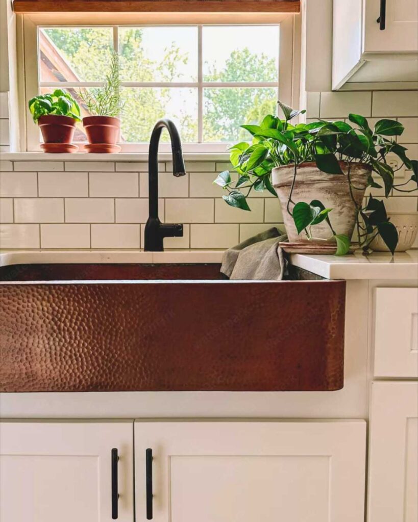 a single copper kitchen sink