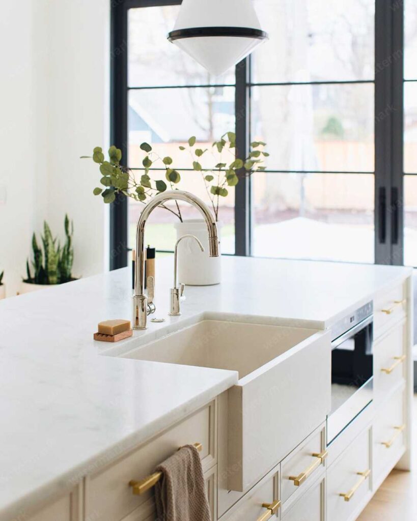 a white single apron kitchen sink