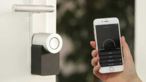 an iphone and smart door lock