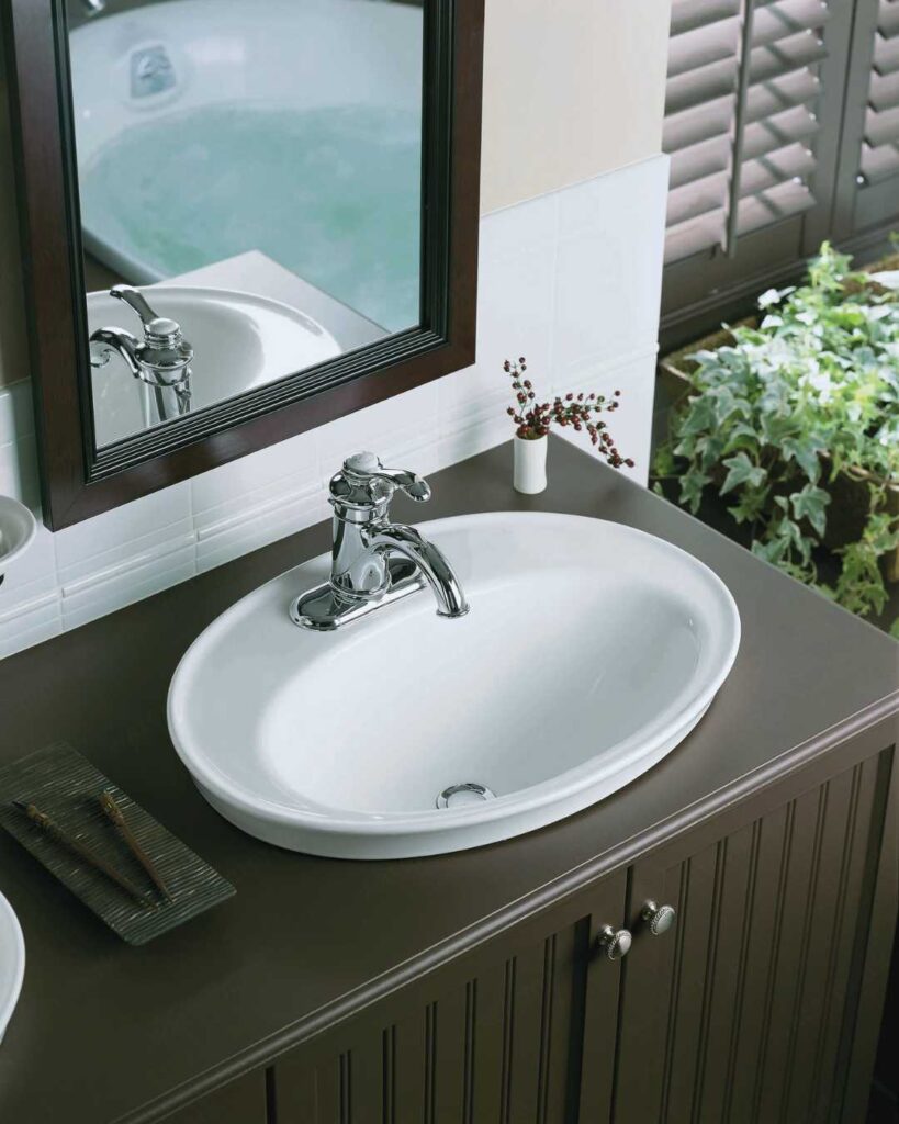 bathroom with drop-in sink