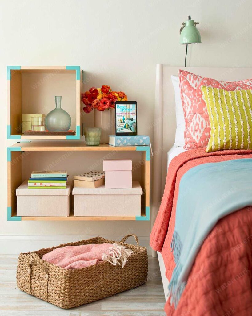 boxes and basket beside a bed