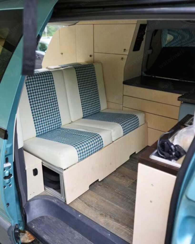 camper van bed ideas with rock and roll seat