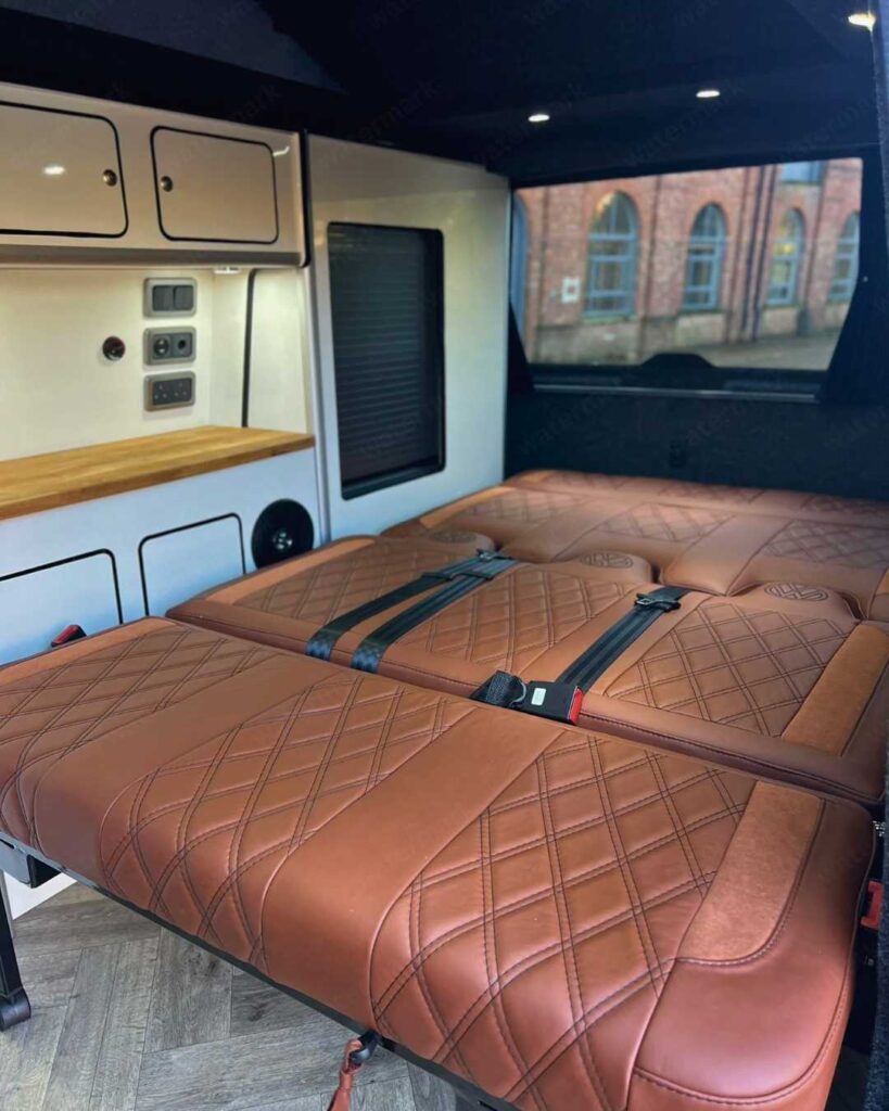 camper van bed ideas with rock and roll seat