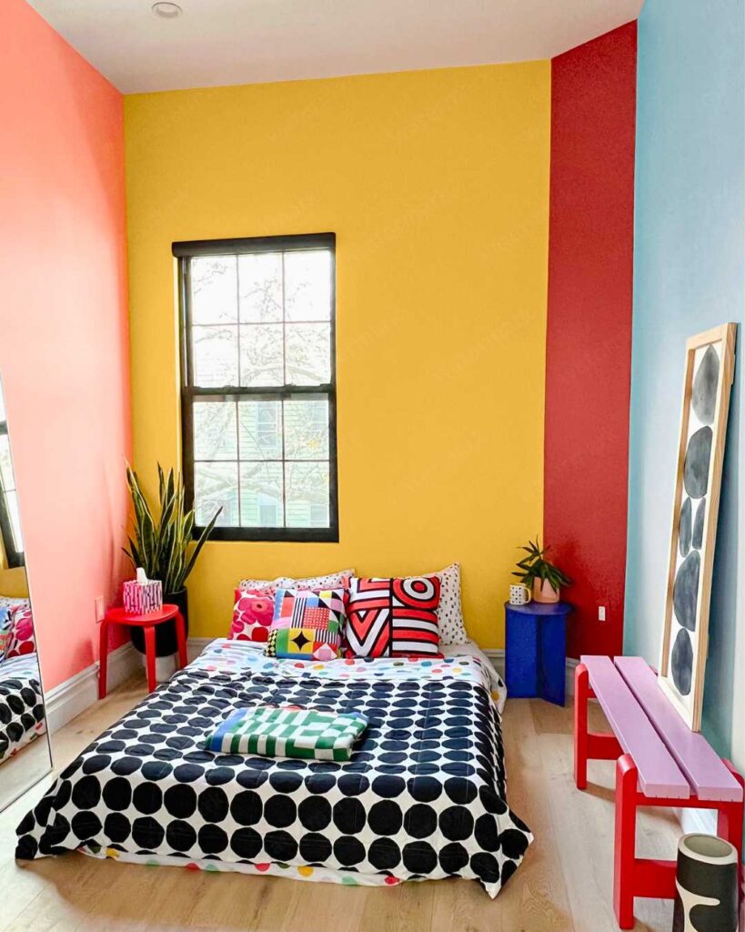 colorful bedroom with accent wall