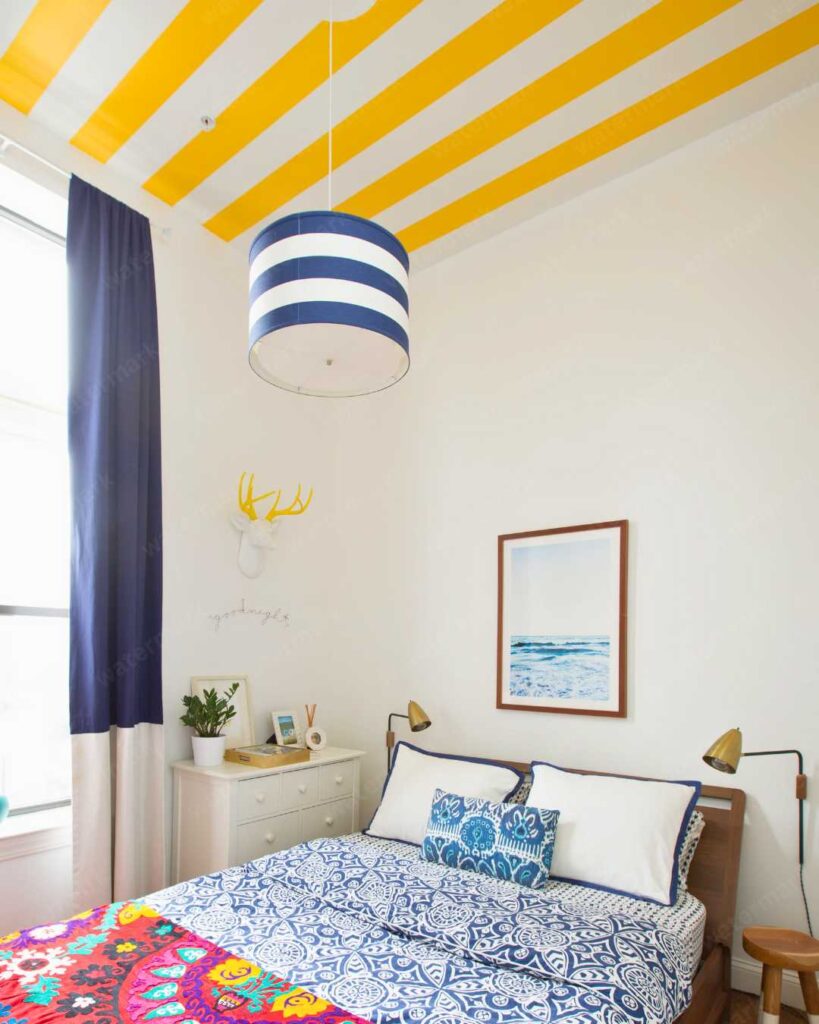 colorful bedroom with stripe ceiling