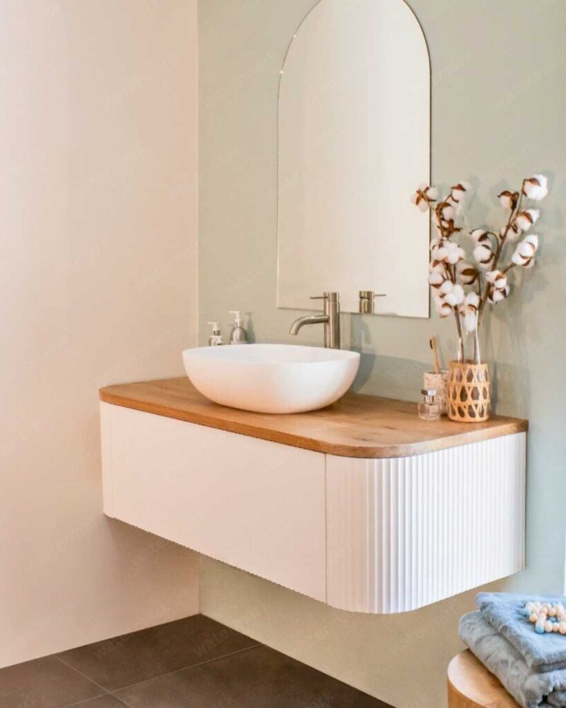 single floating curved vanity