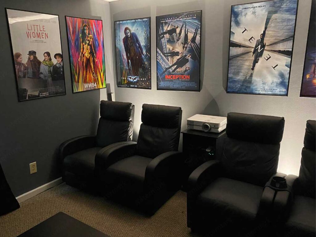 small movie room with poster